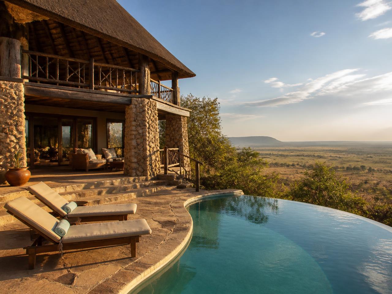 Mid-range safari lodge with a pool overlooking the African savannah